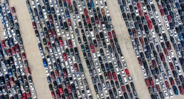 People lined up in their cars at a food distribution site in San Antonio, Tex., on Thursday.