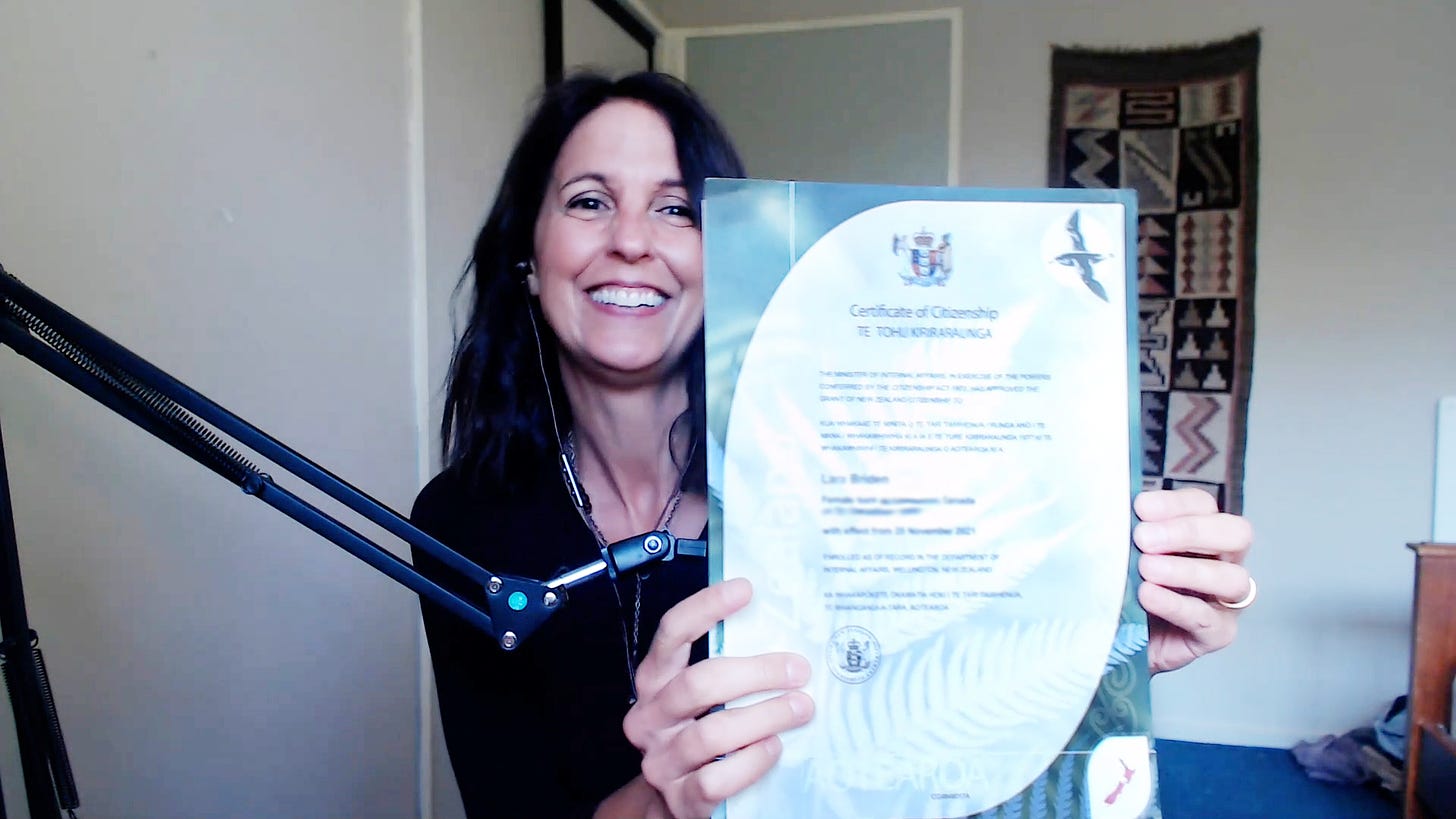 Dr Lara Briden shows of her certificate of New Zealand citizenship
