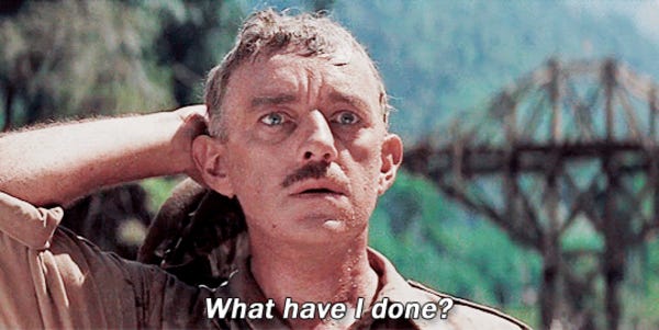 A still from the movie "The Bridge on the River Kwai" showing a close up of Alec Guinness, saying "What have I done?"