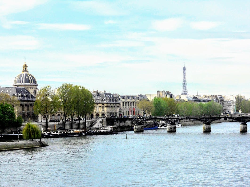 A view of iconic Parisian buildings along the Seine