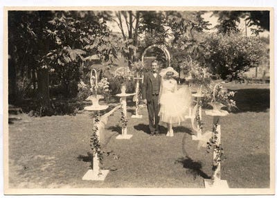Gladys Franklin and John Carroll on their wedding day in 1928