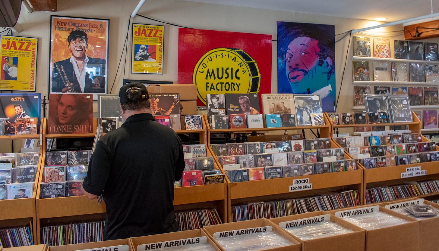 A customer peruses CDs at Lousiana Music Factory.