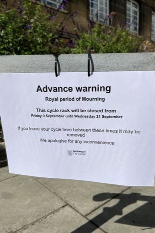 Image of Norwich City Council on a bike rack saying a section of it is closed (following death of Queen Elizabeth II)
