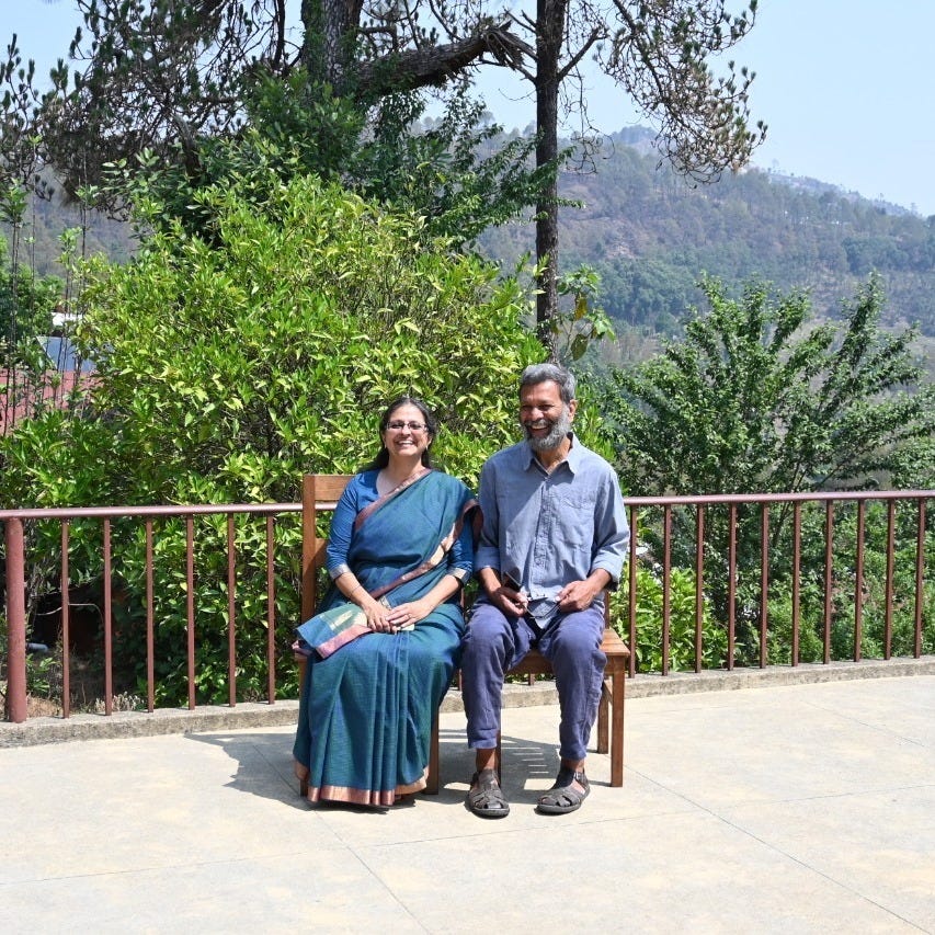 May be an image of one or more people, people standing, outdoors and tree