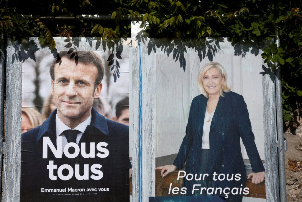 Macron, Le Pen trade blows in final day of french presidential campaign |  PBS NewsHour