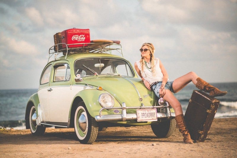 VW with hippy chick.