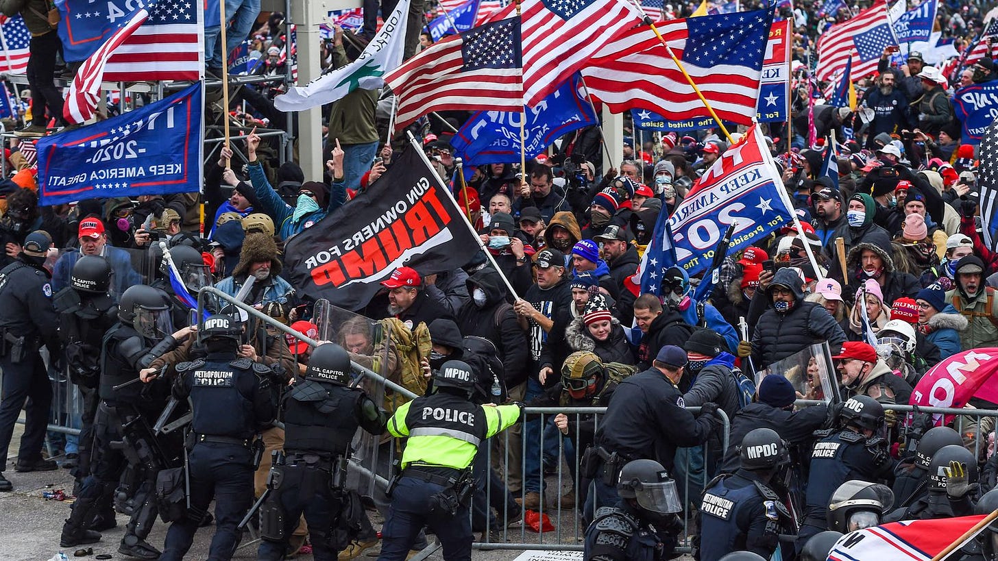 Trump supporters clash with police and security forces as they storm the US Capitol in Washington, D.C. on January 6. Demonstrators breached security and entered the Capitol as Congress debated the 2020 presidential election Electoral Vote Certification.