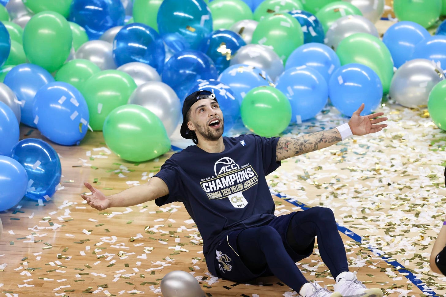 Mar 13, 2021; Greensboro, North Carolina, USA; Georgia Tech Yellow Jackets guard Jose Alvarado (10) celebrates after the Georgia Tech Yellow Jackets defeated the Florida State Seminoles 80-75 to win the 2021 ACC tournament championship game at Greensboro Coliseum. Mandatory Credit: Nell Redmond-USA TODAY Sports