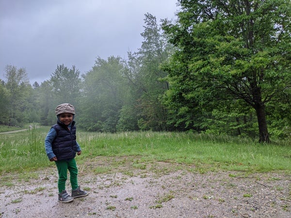 After reading his favorite book, Iman enjoys taking in Vermont’s verdant countryside with his mom, loyal reader Nida.