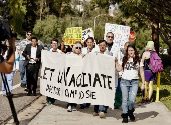 Families Belong Together and Doctors for Camp Closure march to demand CBP give flu shots to detained children