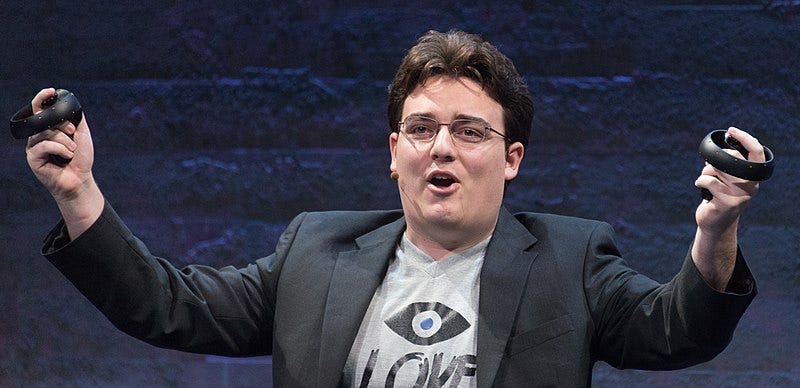 File:Palmer Luckey holding up Oculus Touch prototype (June 11, 2015).jpg