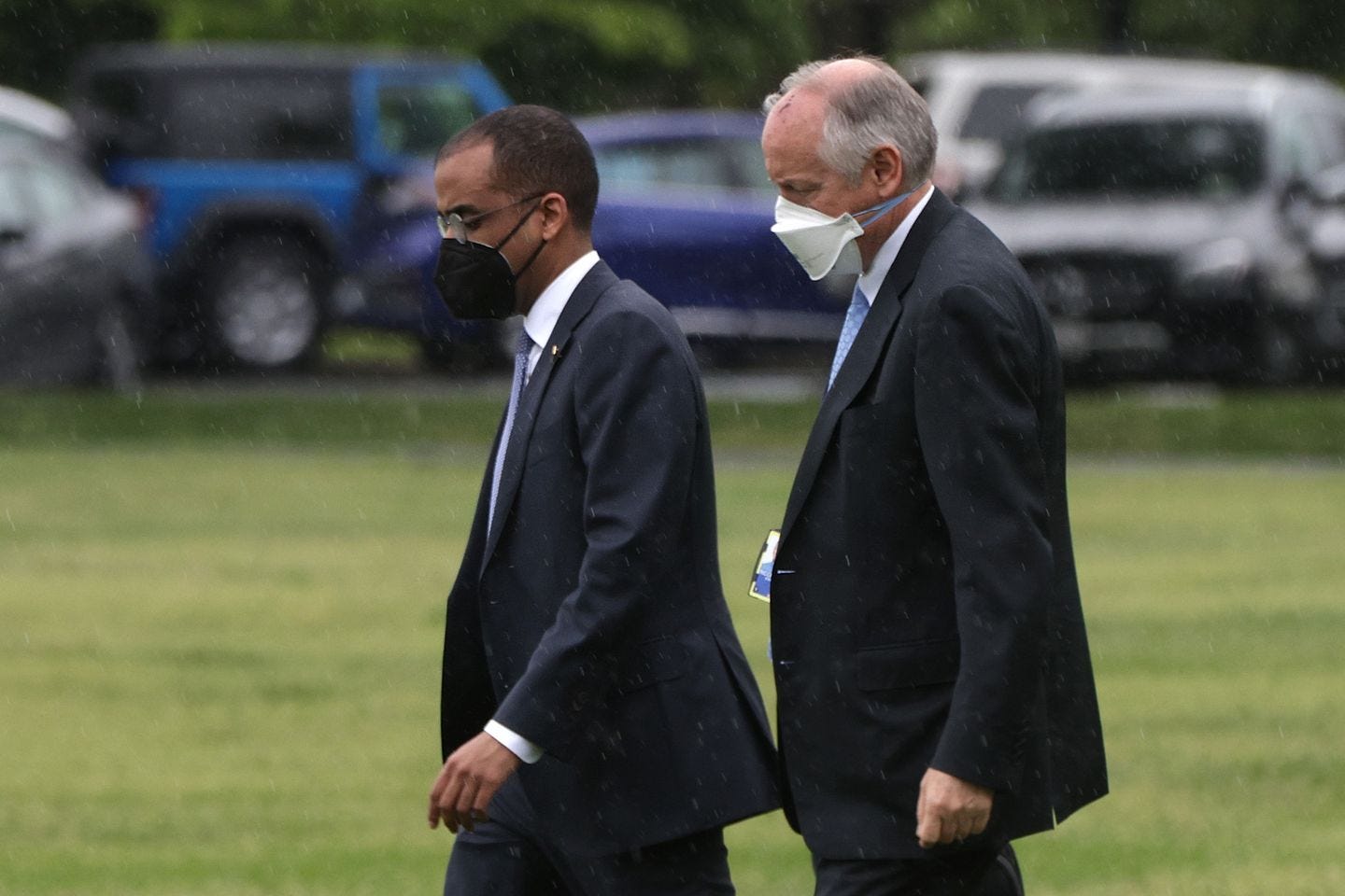 Yohannes Abraham, left chief of staff and executive secretary of the National Security Council, and Steve Ricchetti, right, counselor to President Biden, walked toward the Marine One on May 7 in Washington, D.C. The Treasury Department announced this week it was hiring Ricchetti's son, continuing a pattern in the Biden administration of the relatives of top aides getting jobs.