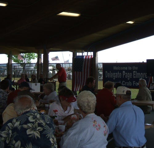 Delegate Page Elmore addresses the feast goers.