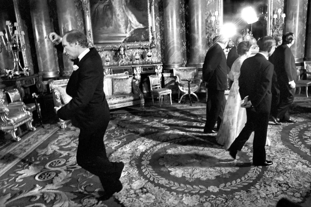 Pierre Trudeau pirouettes during a May 7, 1977, picture session at Buckingham Palace. For years the photo was described as the prime minister twirling behind an oblivious Queen Elizabeth.