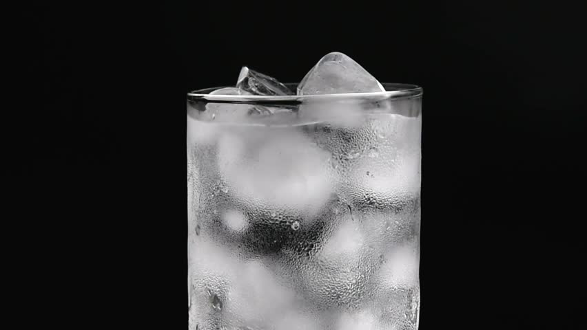 Glass Cup with Ice and Stock Footage Video (100% Royalty-free) 1014081530 |  Shutterstock