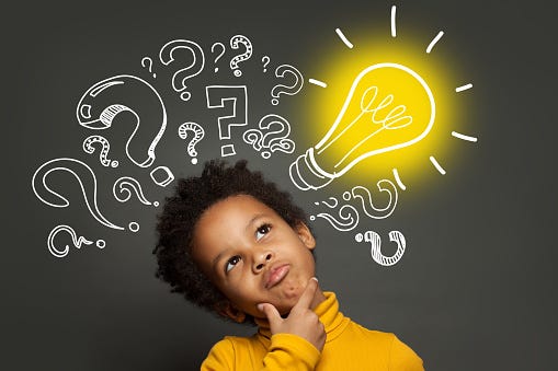 Thinking Child Boy On Black Background With Light Bulb And Question Marks  Brainstorming And Idea Concept Stock Photo - Download Image Now - iStock