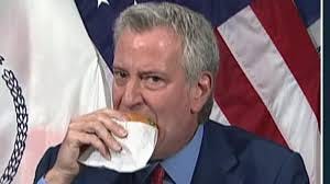 New York City mayor Bill de Blasio eats burger to encourage vaccination  uptake | US News | Sky News