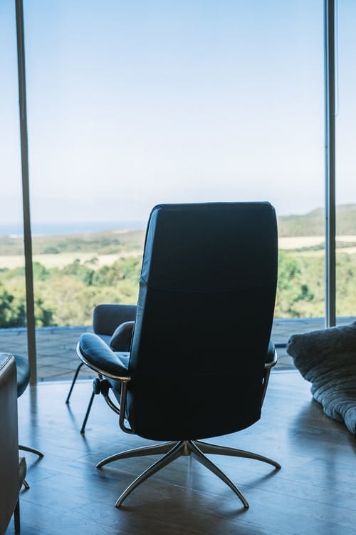 Interior of modern apartment with executive chair