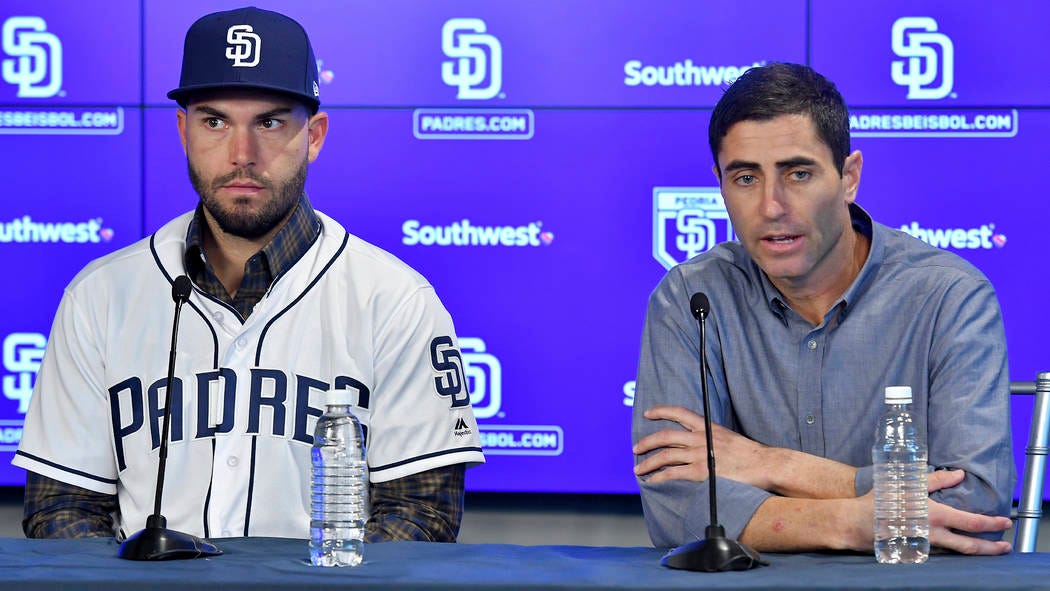 San Diego Padres baseball player Eric Hosmer, left, listens as Padres  general manager A.J. Preller speaks during an introductory press conference  in Peoria, Ariz., Tuesday, Feb. 20, 2018. Hosmer a … |