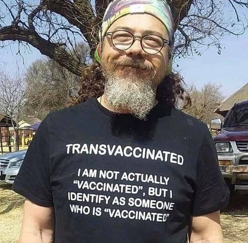 May be an image of 1 person, beard and text that says 'TRANSVACCINATED IAM NOT ACTUALLY "VACCINATED". BUTI IDENTIFY AS SOMEONE WHO IS "VACCINATED"'