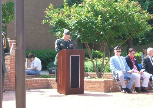 Ed Tattersall reading the names of Wicomico County veterans killed in action since World War I.