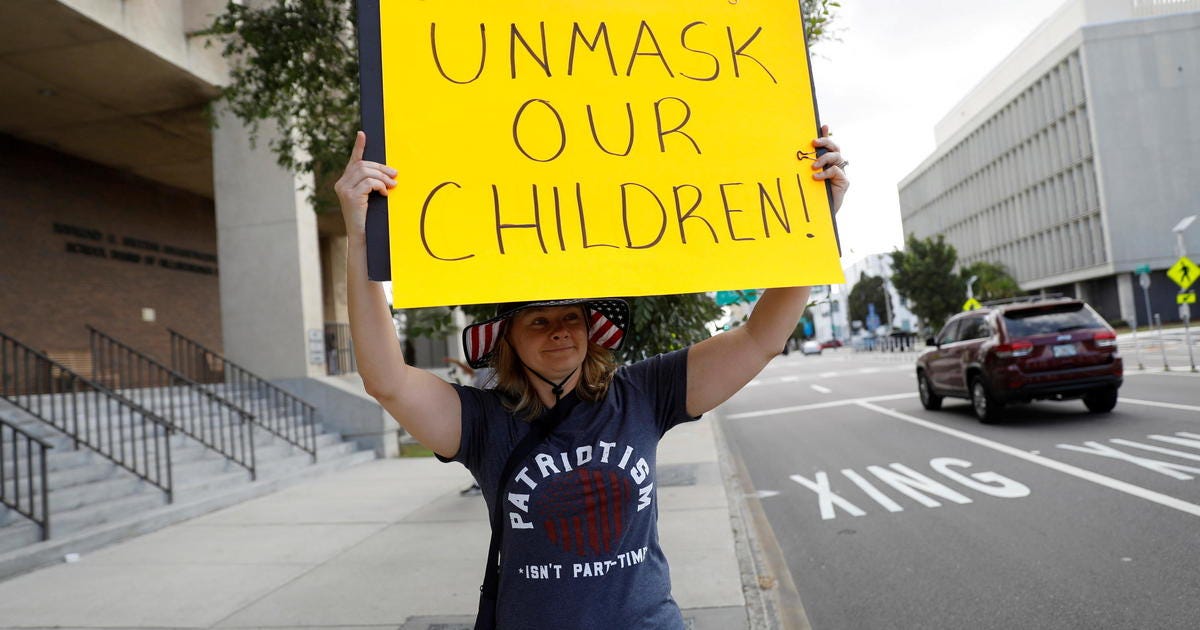 Pressure increases on school districts defying states&#39; mask mandate bans -  CBS News