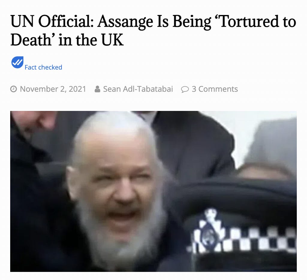 Picture of article from Newspunch. Article headline at the top of image reads: “UN Official: Assange Is Being ‘Tortured to Death’ in the UK”. Dated “November 2, 2021”. The bottom half is a blurry picture of a white man, Julian Assange, with a thick white beard. In front of him is with a British police officer’s wearing a hat.” Behind him are unidentified people in dark suits.