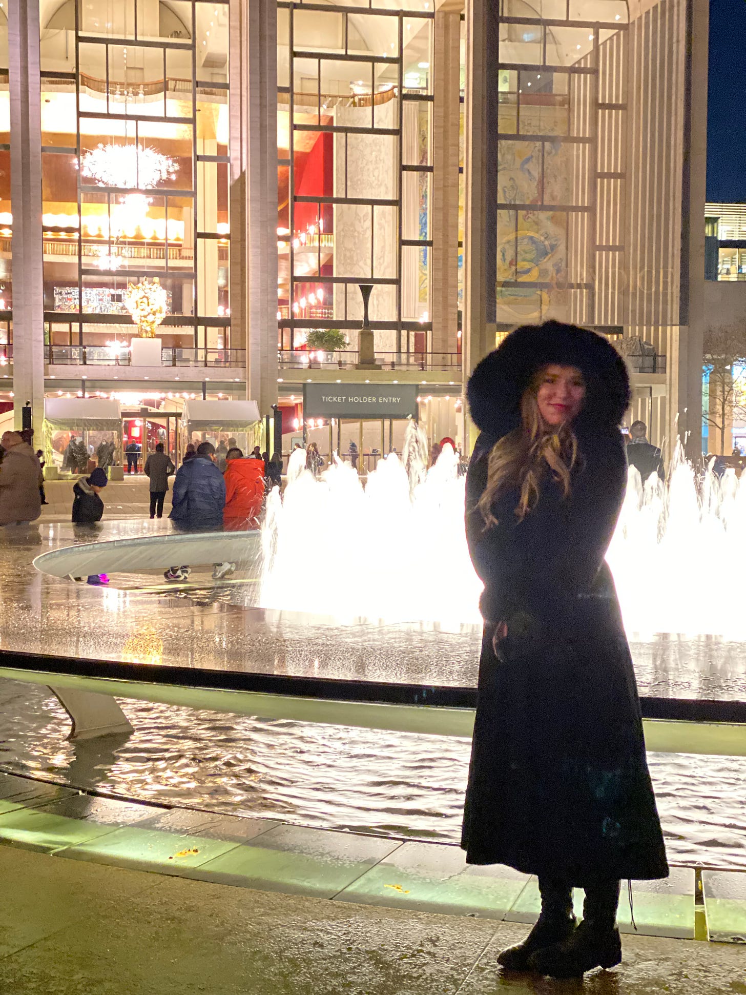I went to the Nutcracker ballet with my high school friend Kristen and she shot this photo of me in front of the Lincoln Center's fountain at 10:22pm after we left. It was a magical evening.