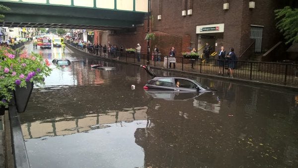 Vehicle trapped in flood water in Wallington, 07 June 2016. Photo: London Fire Brigade