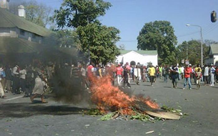 Houses, cars torched during Malawi protests - reports