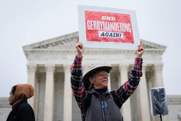 Voting rights activists rally outside the U.S. Supreme Court during oral arguments in the Moore v. Harper case December 7, 2022 in Washington, DC....