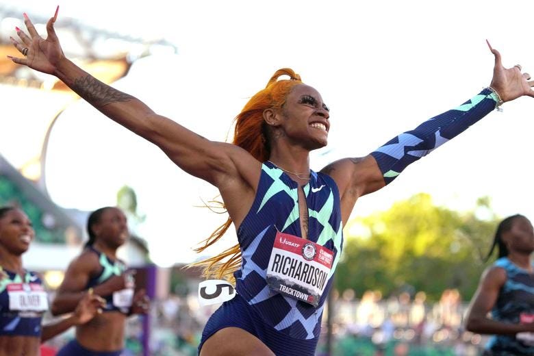 Sha'Carri Richardson celebrates after winning the women's 100-meter finals in 10.87 during the U.S. Olympic Team Trials at Hayward Field in Eugene, Oregon, June 19, 2021. Billed as American athletics' next star, the 5-foot, 1-inch dynamo didn't disappoint, torching the race with her trademark flourish at the U.S. Olympic trials, raising her arms to the sky and letting out a cheer in front of an elated crowd as she booked her ticket to Tokyo. "I'm highly blessed and grateful," said Richardson, who told a television reporter that she learned last week that her biological mother had passed away. "Nobody but them and my coach know what I go through on a day-to-day basis," pointing to her family, moments after she had embraced her grandmother in the stands. Kirby Lee-USA TODAY Sports