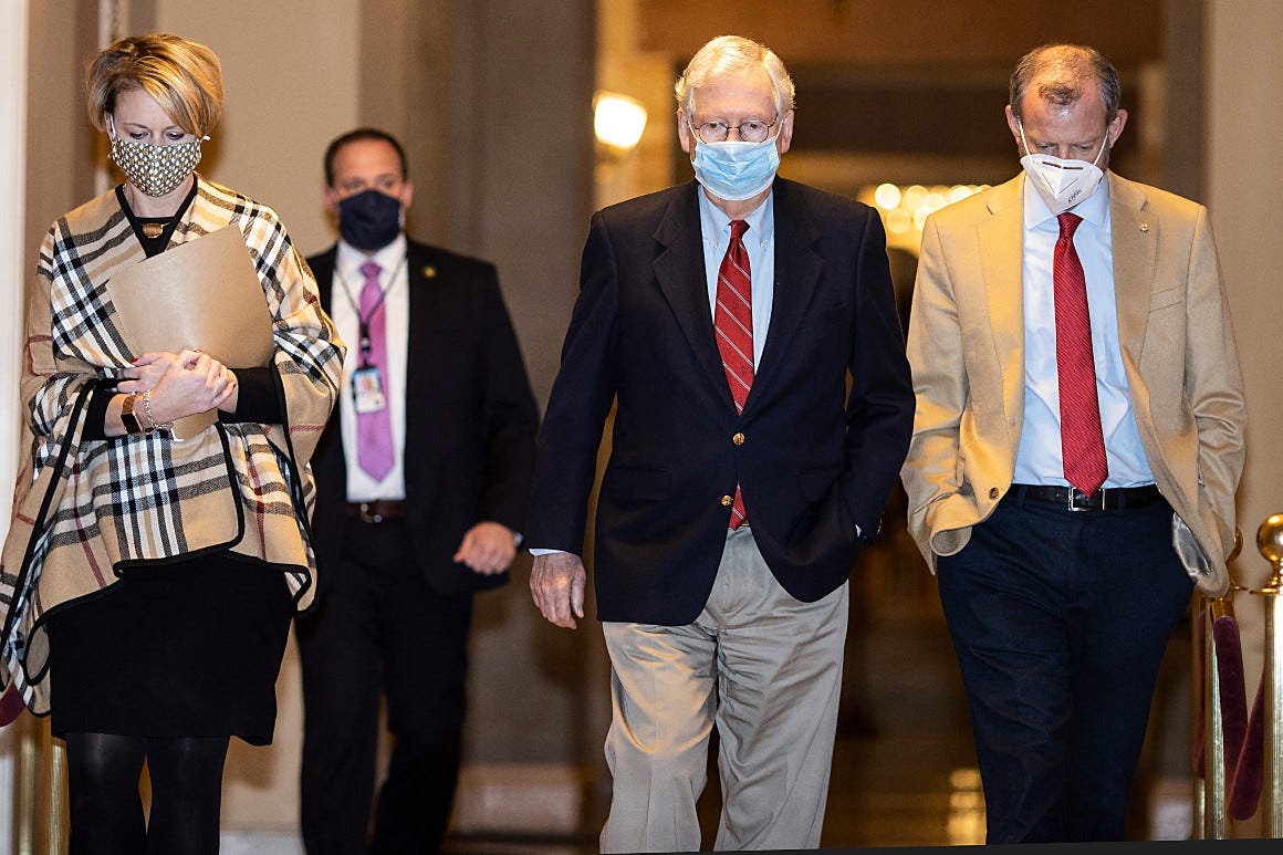 U.S. Senate Majority Leader Mitch McConnell (R-KY) walks to the senate floor on Capitol Hill on Dec. 20, 2020 in Washington, D.C. 