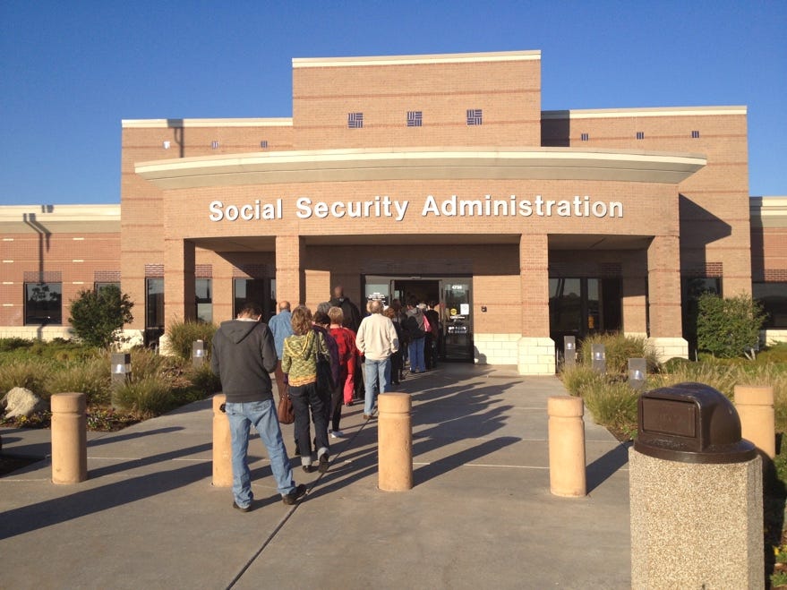 A group of people walking out of a building

Description automatically generated with medium confidence