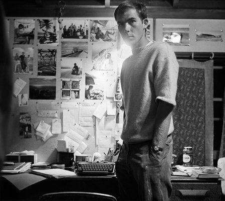 Young Hunter S. Thompson with his Olympia SF Typewriter. : typewriters