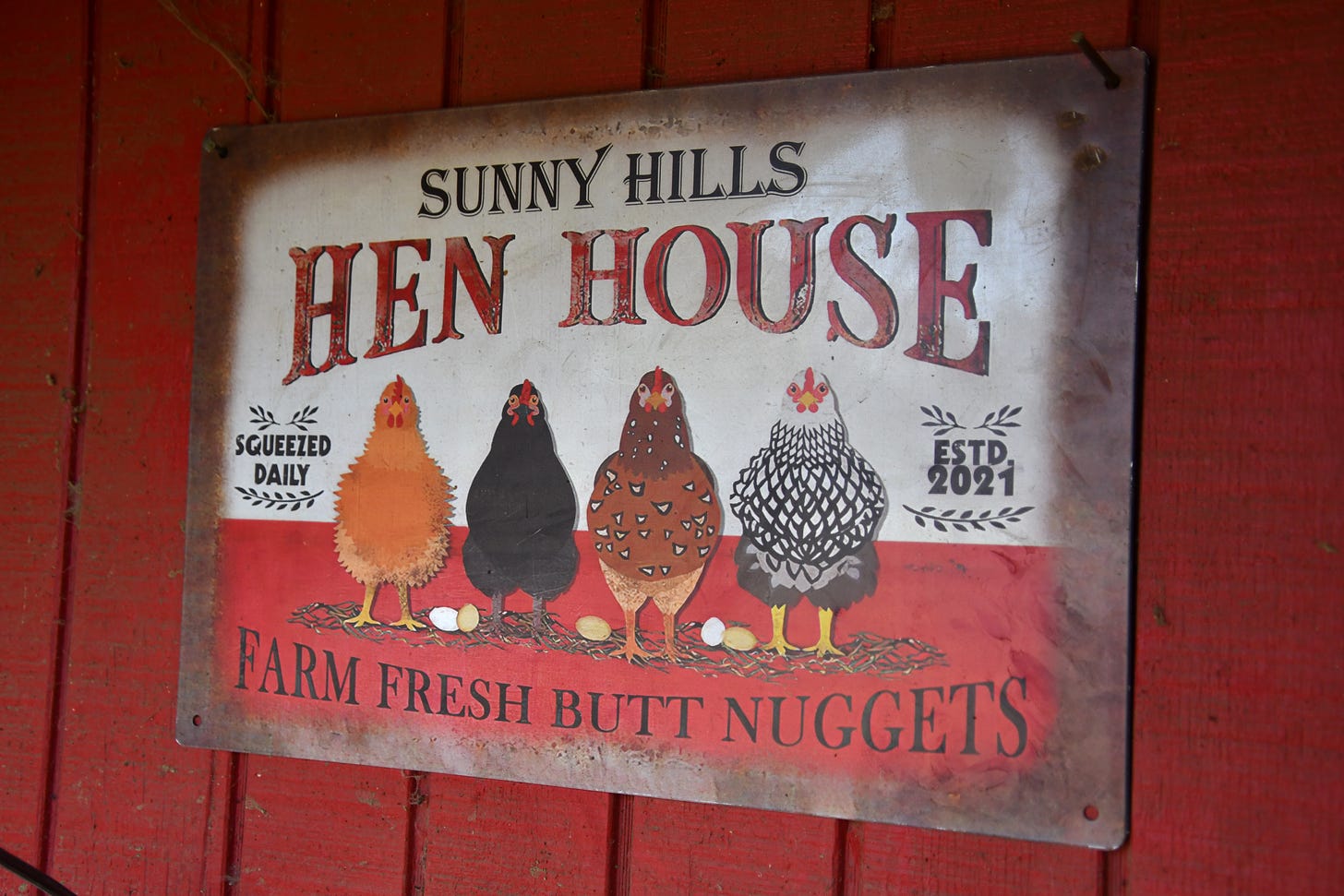 Sunny Hill farm sign on hen house