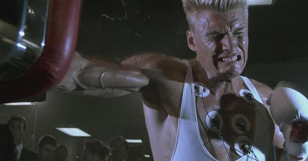 Rocky IV Villain Dolph Lundgren Shows Dolph Lundgren Shows How To Stay Fit  In Isolation With Exercise Band Workout - Maxim