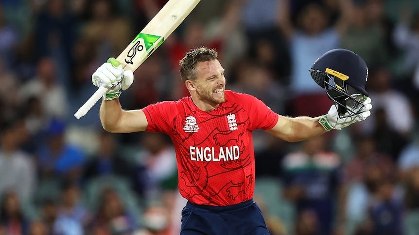 Jos Buttler swings his bat and yells in celebration