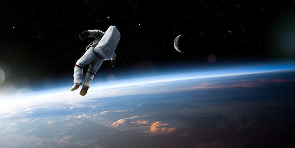 ✓ Astronaut Floating In Space Stock Photos