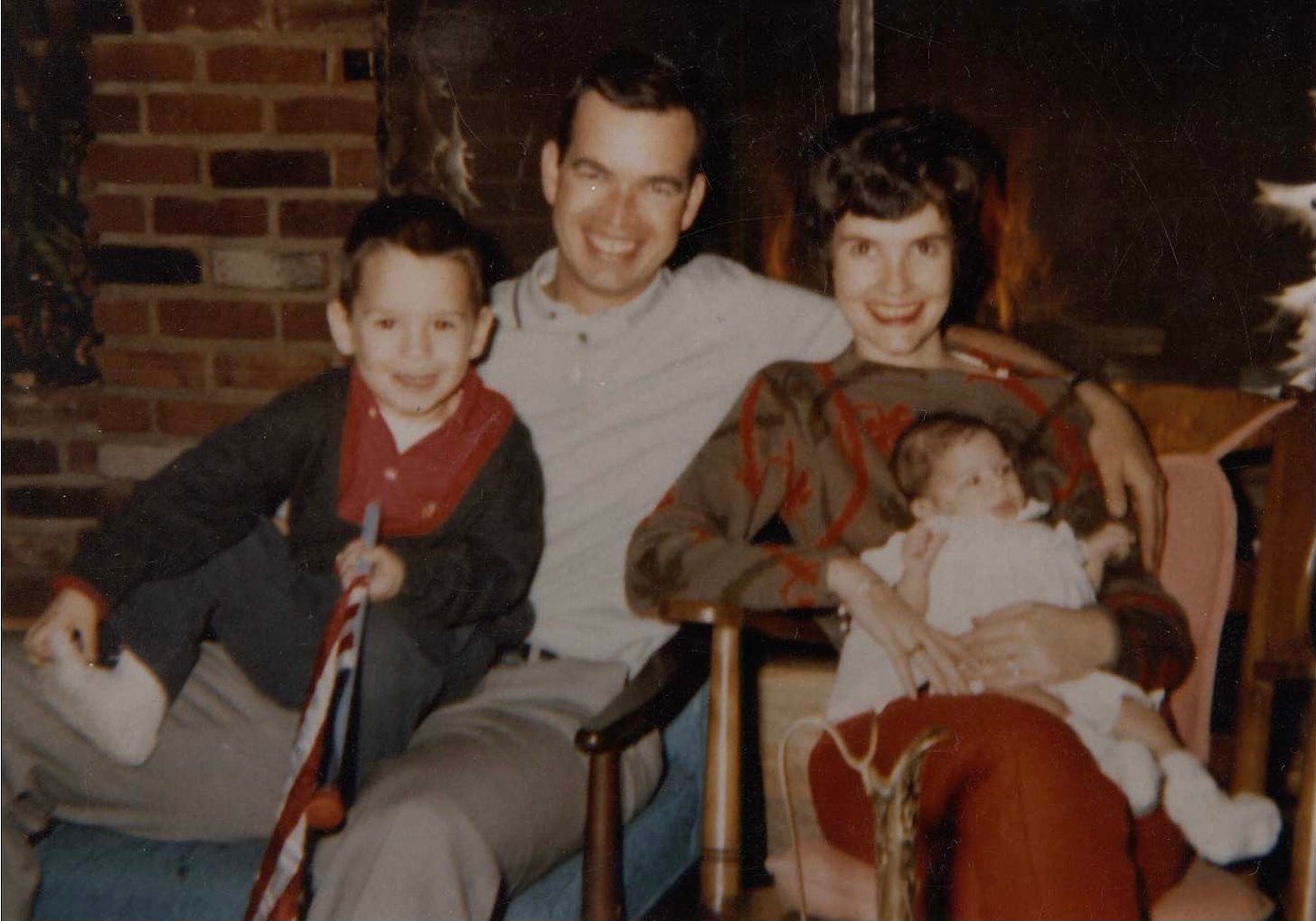 Image of author as an infant with family, Bud, Janet and Brian in 1964