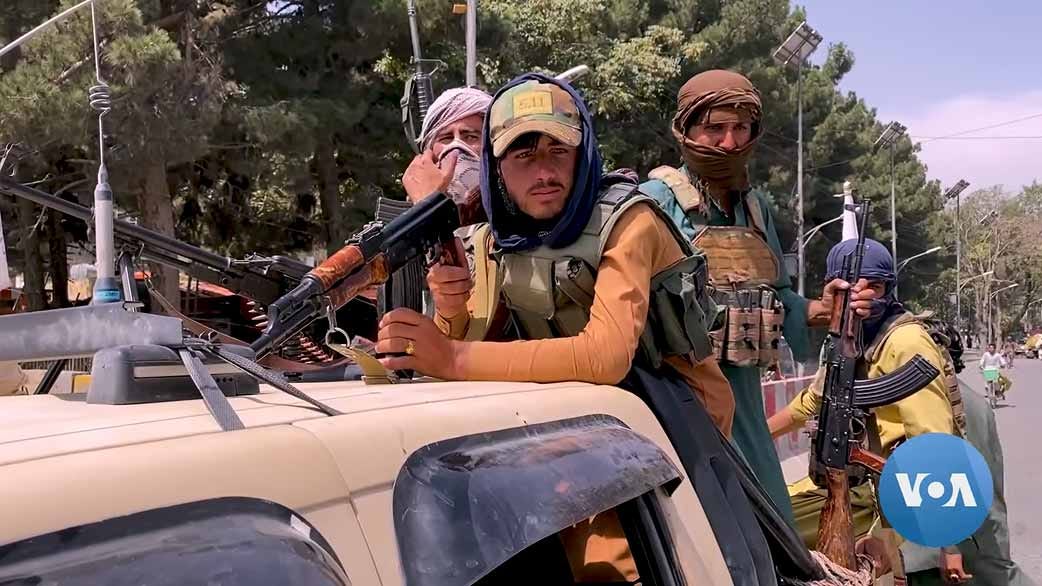 Taliban fighters in a pickup truck in Kabul