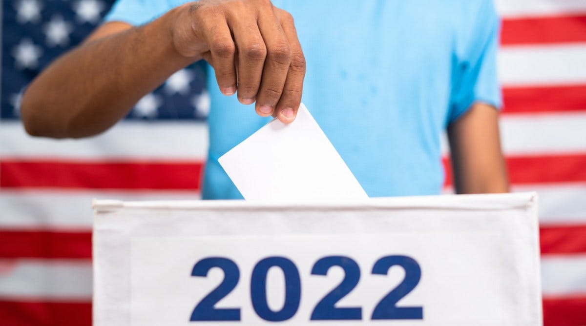 Non-religious voters gave Democrats crucial wins. Will people notice? | Man votes during 2022 midterms