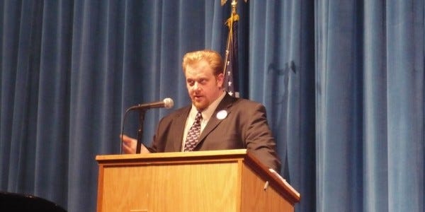 Jeff at the podium in dumber days