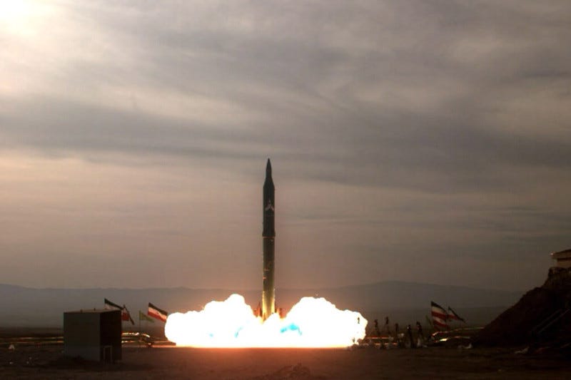 Picture obtained from the Iranian ISNA news agency on Dec. 16, 2009 shows the test-firing at an undisclosed location in Iran of an improved version of the Sejil 2 medium-range missile which the Islamic republic says can reach targets inside Israel.