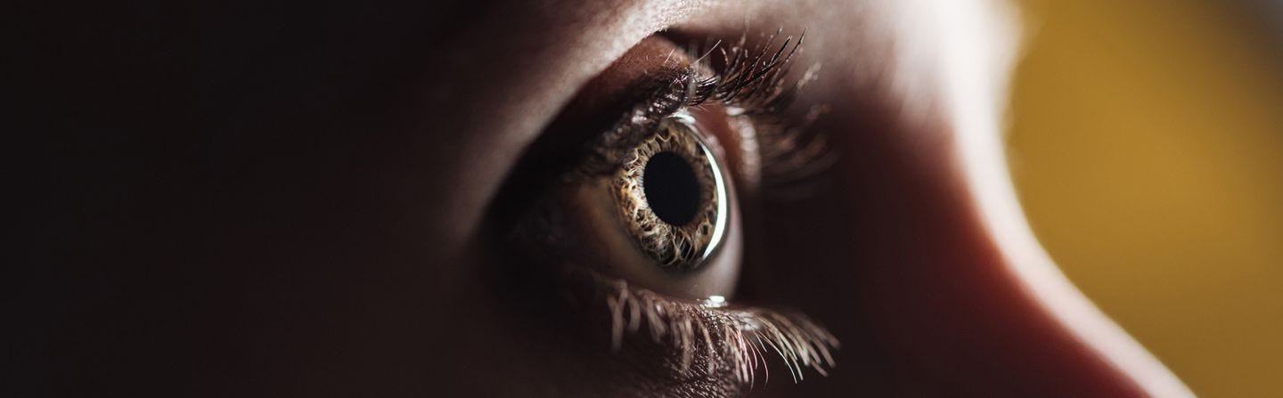 A team of scientists announced Monday that they had partially restored the sight of a blind man by building light-catching proteins in one of his eyes.