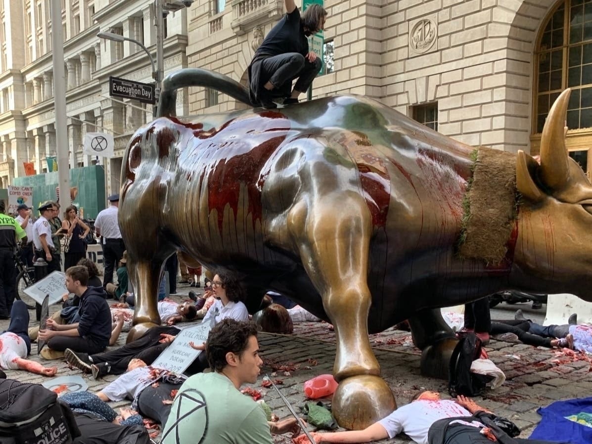 Protesters Dump Fake Blood On Charging Bull; Dozens Arrested | Tribeca, NY  Patch