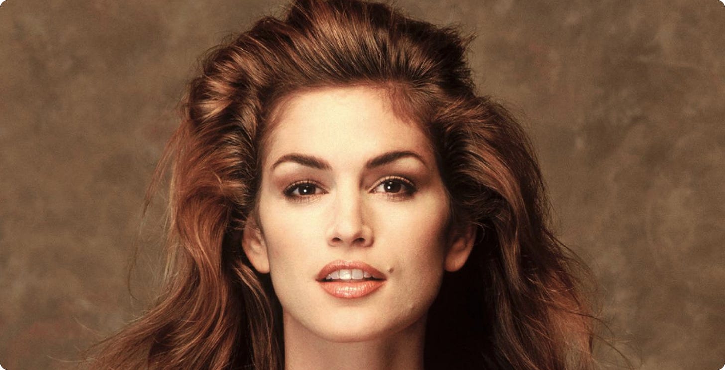 Photo of model Cindy Crawford and her infamous mole in the 90s