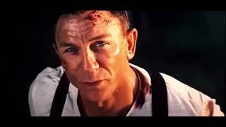 James Bond (played by Daniel Craig) looks heavenward in this still image from No Time to Die.