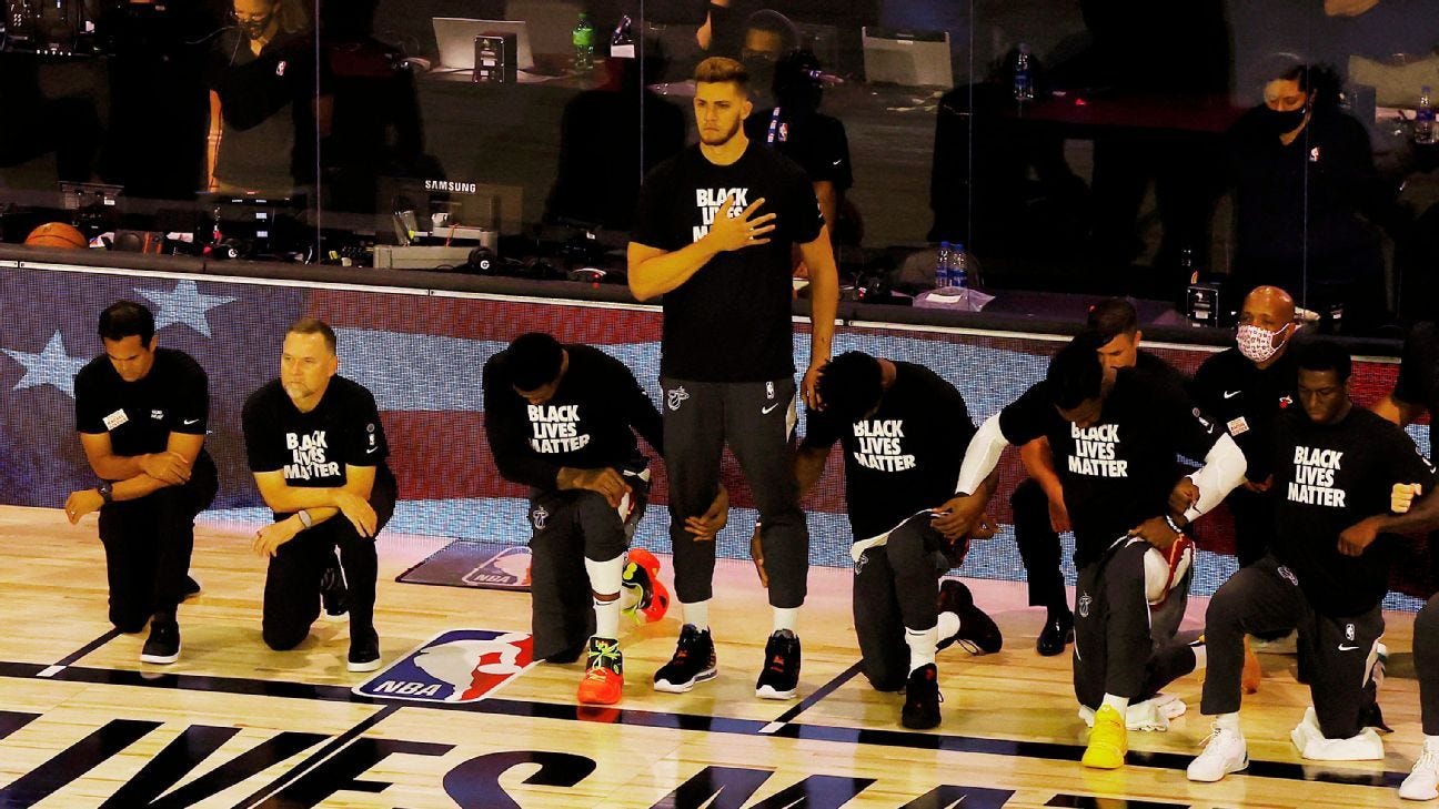 Miami Heat's Meyers Leonard chooses to stand during national anthem