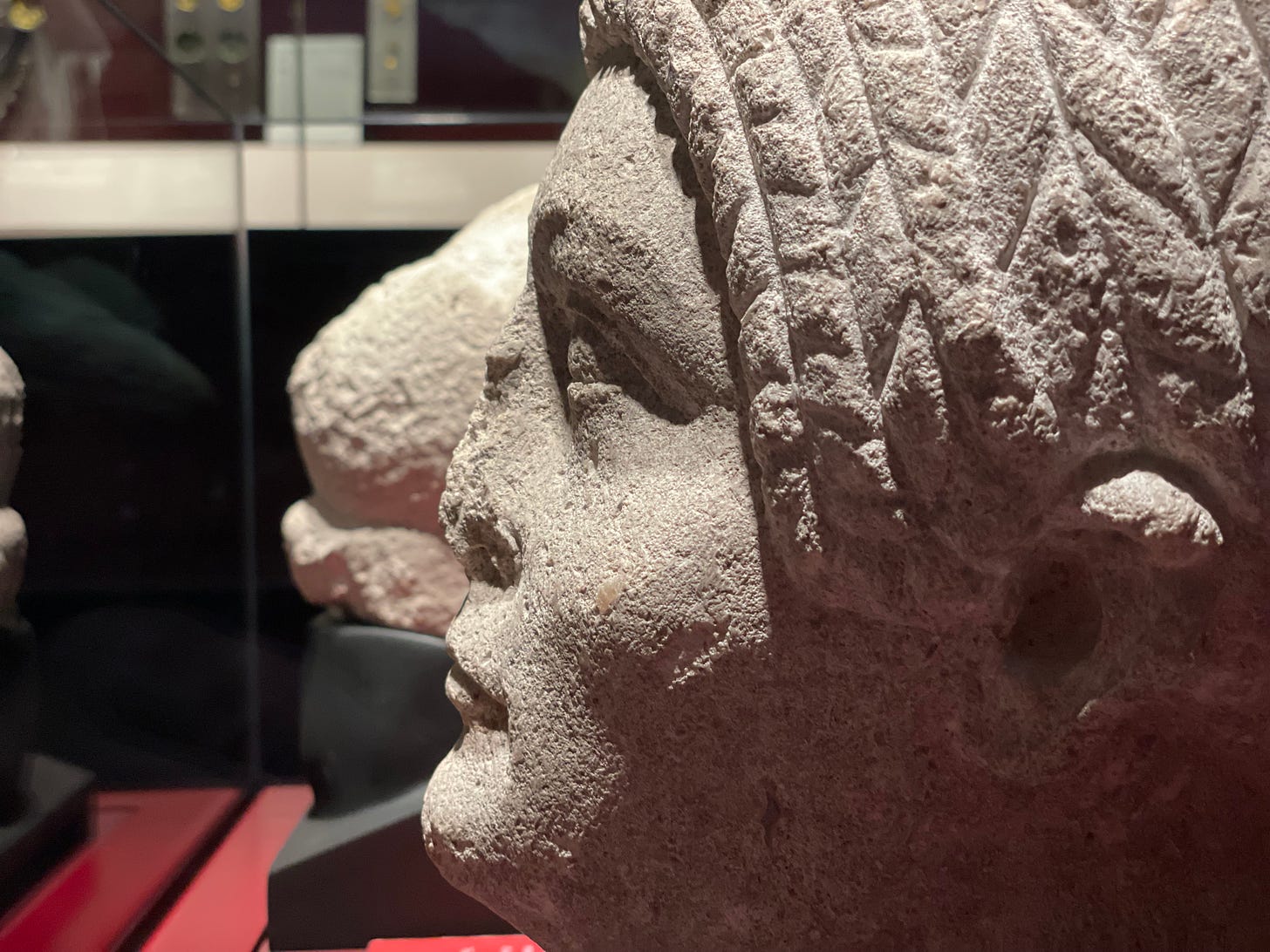 The stone head of a Roman lady excavated from a derelict Norman church at Stoke Mandeville Buckinghamshire